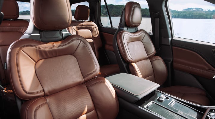 The front row's Perfect Position Seats in a 2024 Lincoln Aviator® Reserve model with Ebony Roast interior | Klaben Lincoln in Kent OH