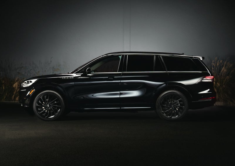 A 2024 Lincoln Aviator® SUV is shown in the Infinite Black exterior color | Klaben Lincoln in Kent OH
