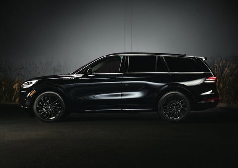 A 2024 Lincoln Aviator® SUV is shown in the Infinite Black exterior color | Klaben Lincoln in Kent OH