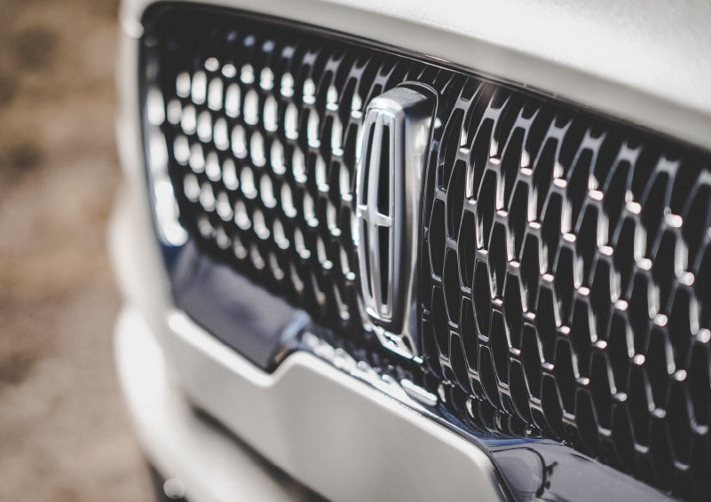 The grille of the 2024 Lincoln Aviator® Reserve model with an eye-catching repeated field of Lincoln Star logo shapes | Klaben Lincoln in Kent OH