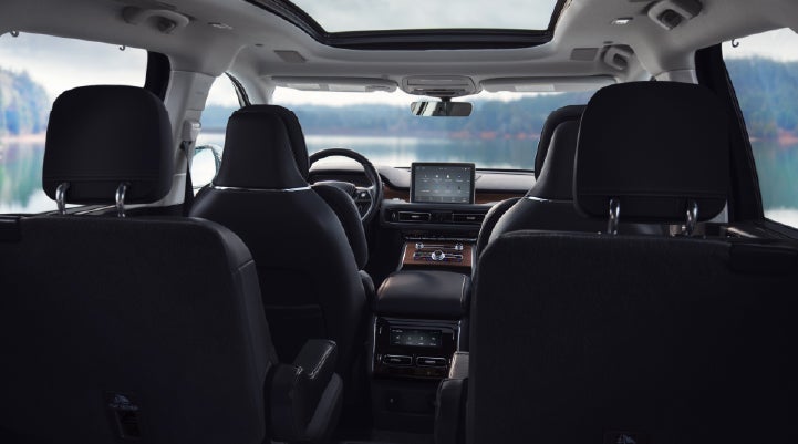 The interior of a 2024 Lincoln Aviator® SUV from behind the second row | Klaben Lincoln in Kent OH