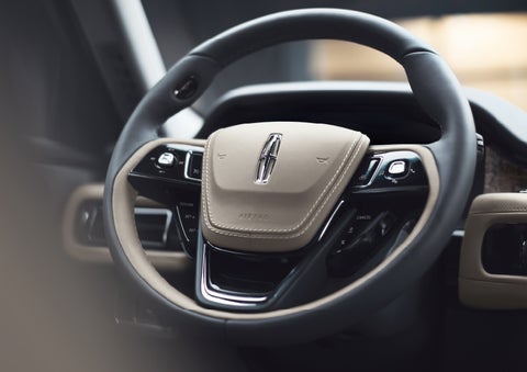 The intuitively placed controls of the steering wheel on a 2024 Lincoln Aviator® SUV | Klaben Lincoln in Kent OH