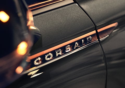 The stylish chrome badge reading “CORSAIR” is shown on the exterior of the vehicle. | Klaben Lincoln in Kent OH