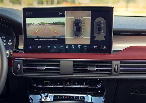 The driver of a 2024 Lincoln Corsair® SUV is shown selecting the drive mode. | Klaben Lincoln in Kent OH