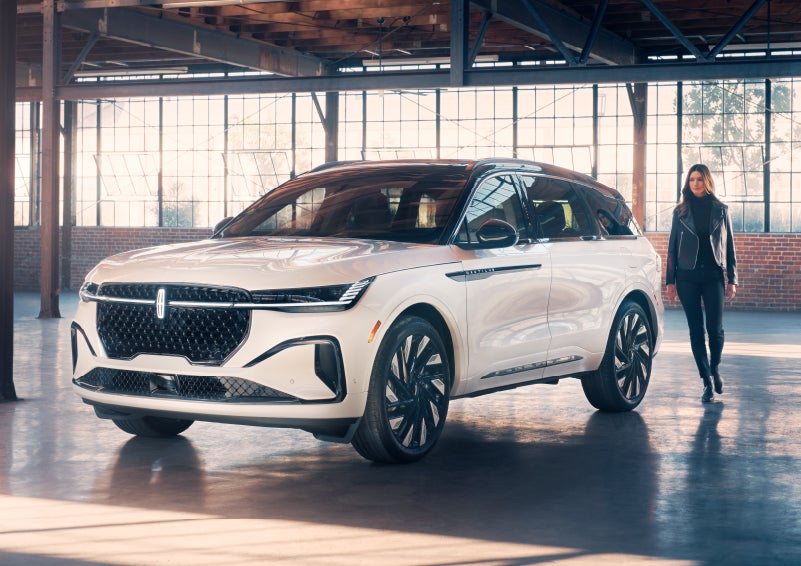 A person approaches a 2024 Lincoln Nautilus® SUV. | Klaben Lincoln in Kent OH