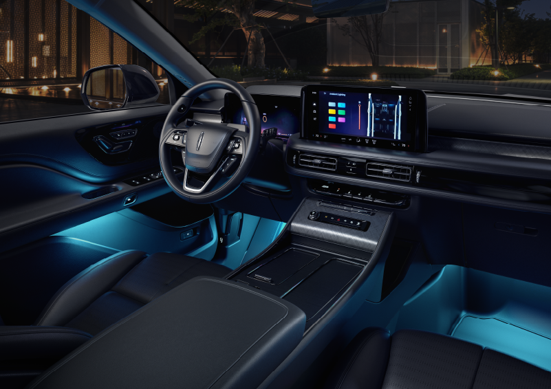 Deep blue ambient lighting glows from various places within a 2025 Lincoln Aviator® SUV. | Klaben Lincoln in Kent OH