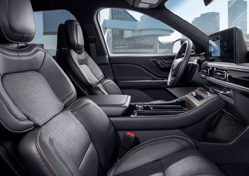The interior of the 2025 Lincoln Aviator® SUV is shown with sleek black accents. | Klaben Lincoln in Kent OH