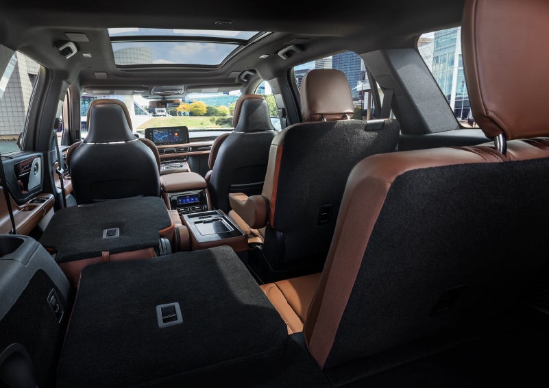The interior of the 2025 Lincoln Aviator® SUV is shown with two seats folded down for added space. | Klaben Lincoln in Kent OH