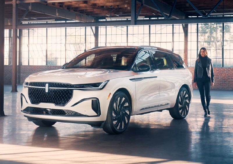 A person approaches a 2025 Lincoln Nautilus® SUV. | Klaben Lincoln in Kent OH