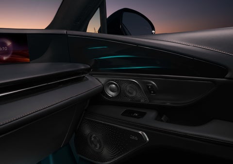 Selectable ambient lighting glows in the passenger door panel. | Klaben Lincoln in Kent OH