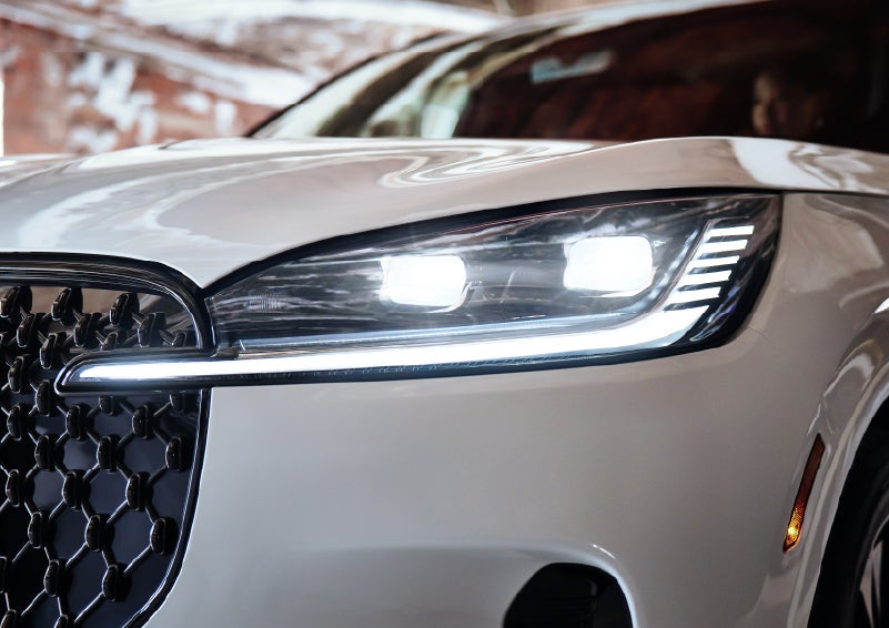 A close-up of a headlamp on the 2026 Lincoln Aviator® SUV is shown. | Klaben Lincoln in Kent OH