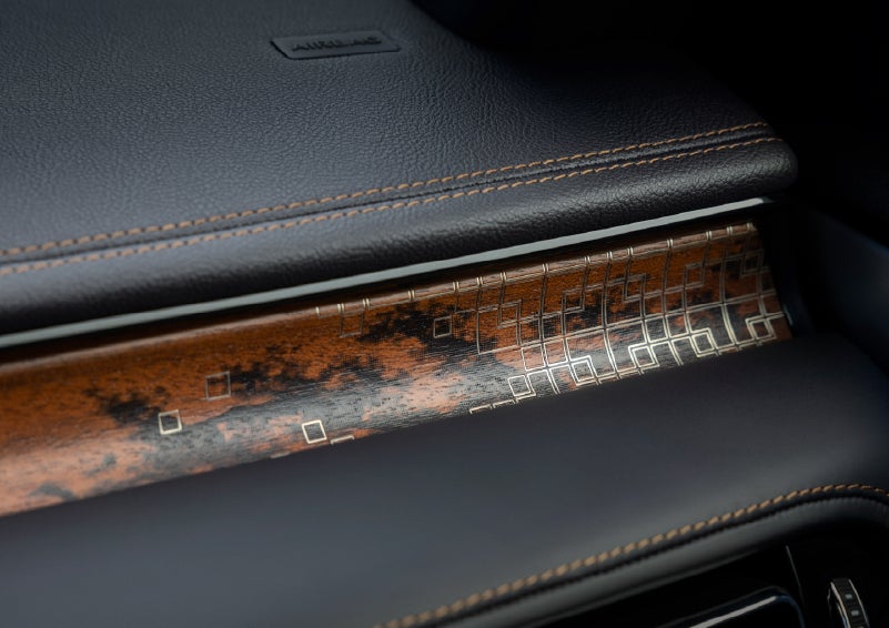 A close-up shot of the 2026 Lincoln Aviator® dashboard with unique black and brown accents and brown stitching. | Klaben Lincoln in Kent OH
