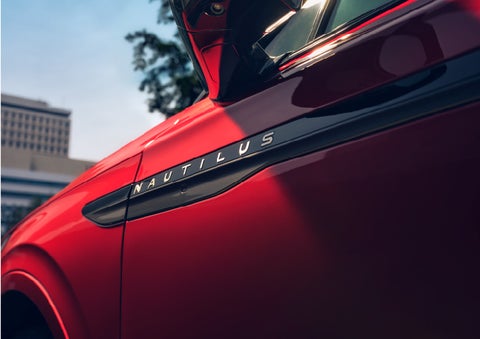 A side badge on the passenger door reads Nautilus. | Klaben Lincoln in Kent OH