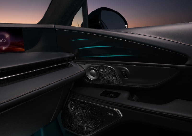 Selectable ambient lighting glows in the passenger door panel. | Klaben Lincoln in Kent OH