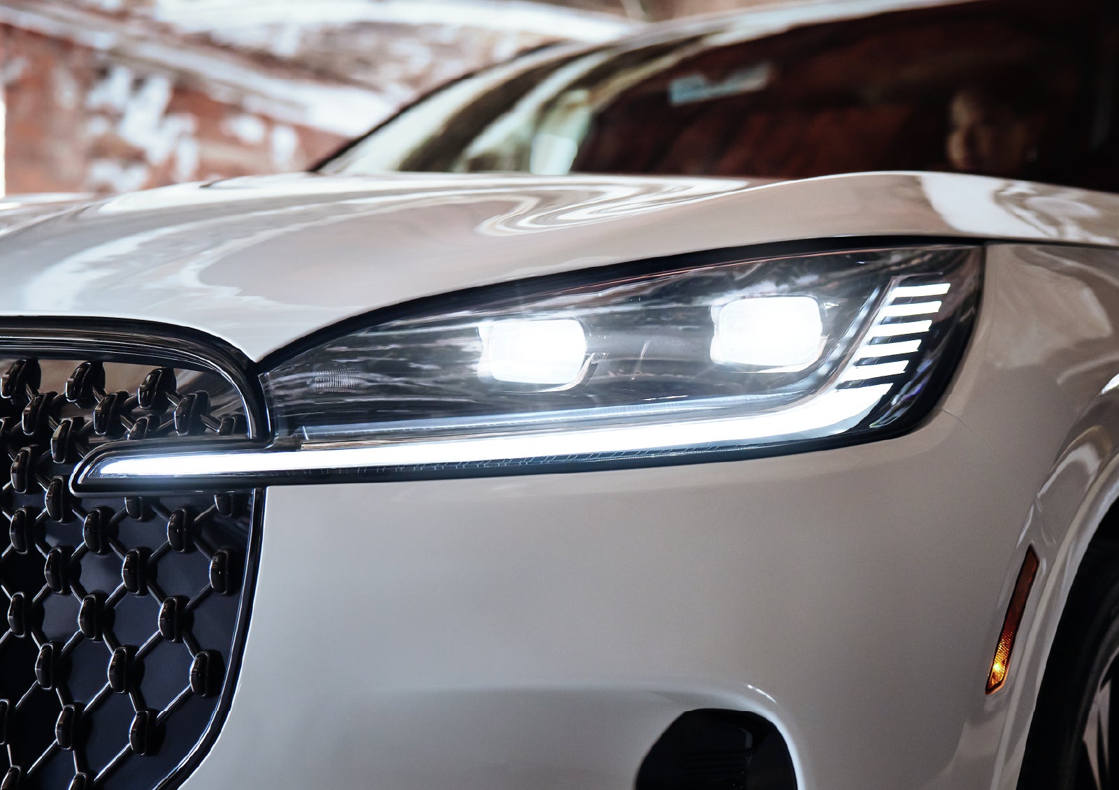 A close-up of a headlamp on the 2027 Lincoln Aviator® SUV is shown. | Klaben Lincoln in Kent OH